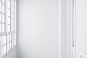 White balcony with paned window