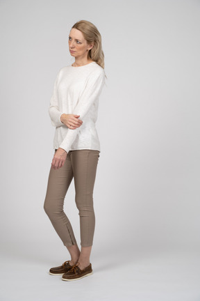 Woman in casual clothes standing