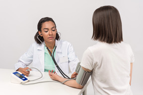 Concentrated on patient's examination