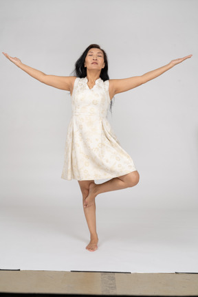 Woman in beautiful dress standing