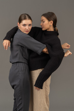 Two women hugging