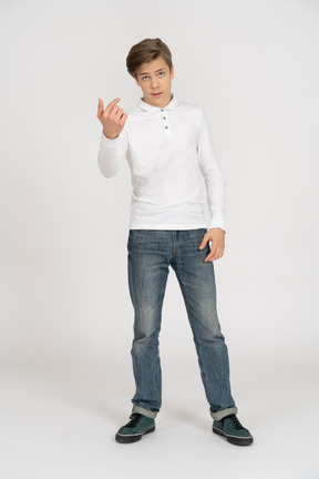 Young man in casual clothes standing