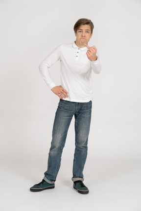 Young man in casual clothes standing