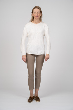 Woman in casual clothes standing