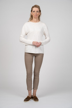 Woman in casual clothes standing