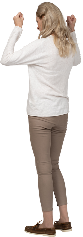 Woman in casual clothes standing