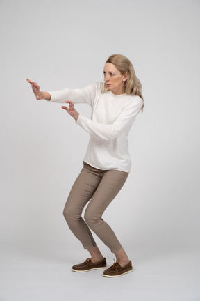 Woman in casual clothes standing
