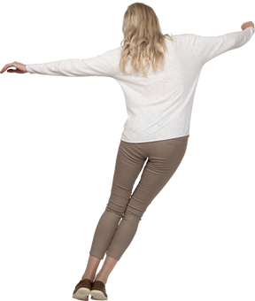 Woman in casual clothes jumping