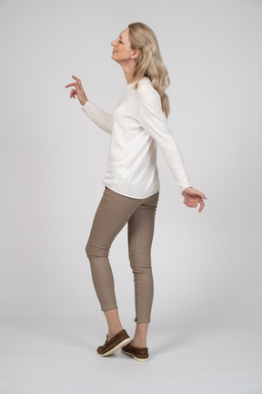 Woman in casual clothes posing