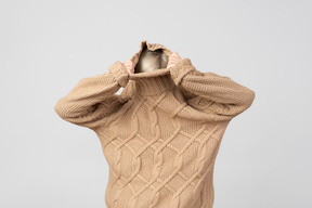 Hiding from the world in a big sweater