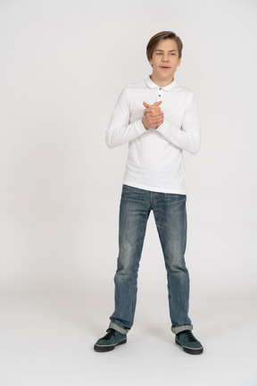 Young man in casual clothes standing