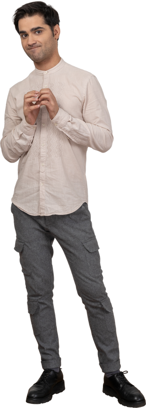 Man in shirt looking at camera